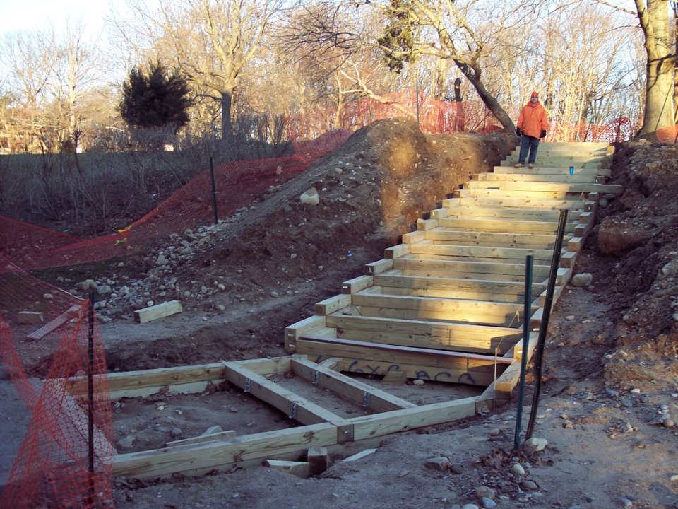 Terranova worker building the hillside stairs at Tabler Residential Quad